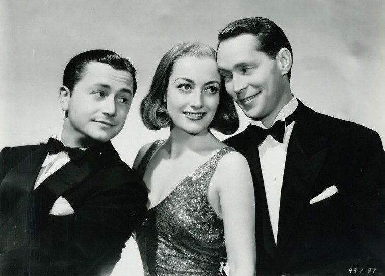 1937. 'The Bride Wore Red' publicity. With Robert Young and Franchot Tone.