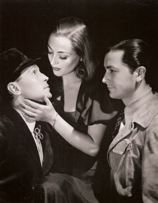 1937. 'The Bride Wore Red.' With Franchot Tone, left, and Robert Young.