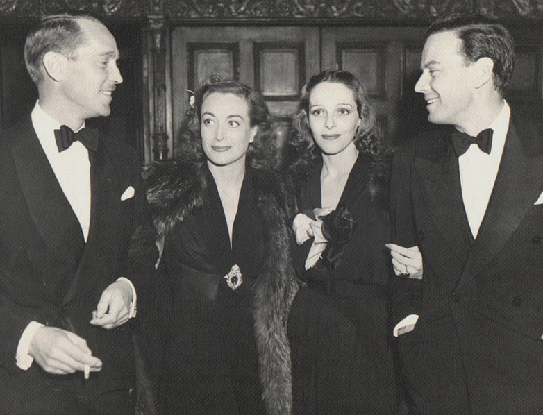 1937. With Franchot Tone, left, and Sally Blane.