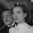 1937. On the set of 'Mrs. Cheyney' with Frank Morgan.