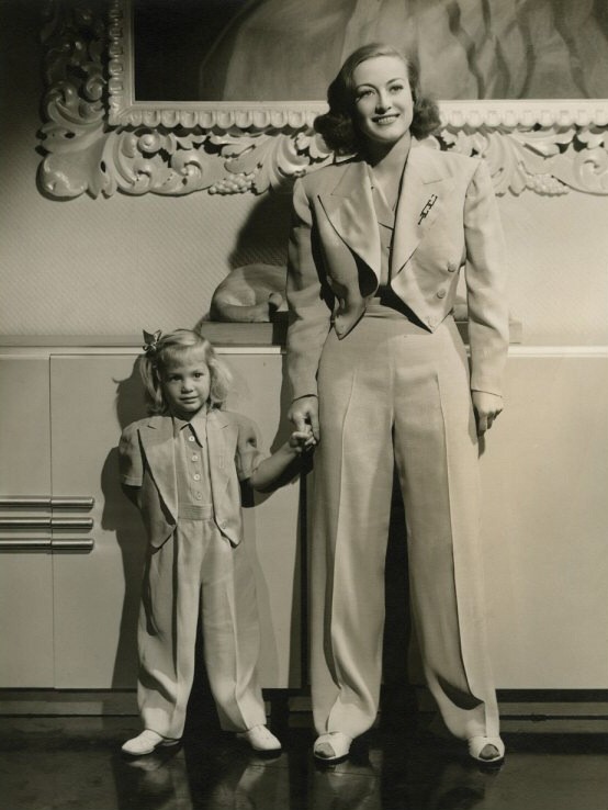 1937 with niece Joanie LeSueur. Shot by Hurrell. (Thanks to HB.)
