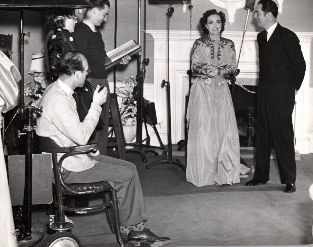 1937. On the set of 'The Last of Mrs. Cheyney' with William Powell and crew.