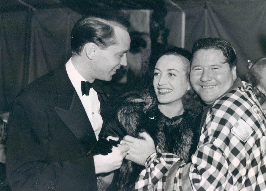 October 1937, with Franchot Tone and old New York friend, comedian Jack Oakie.