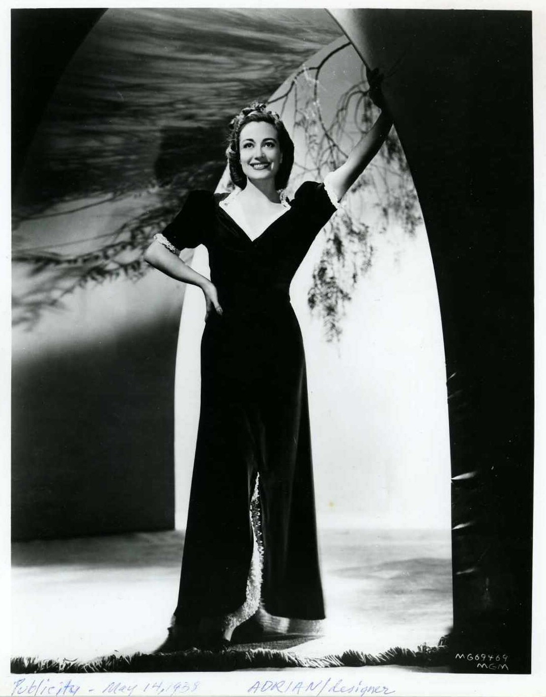May 14, 1938, publicity shot by Willinger. Dress by Adrian.