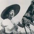 July 1938 with her polo pony 'Secret.'