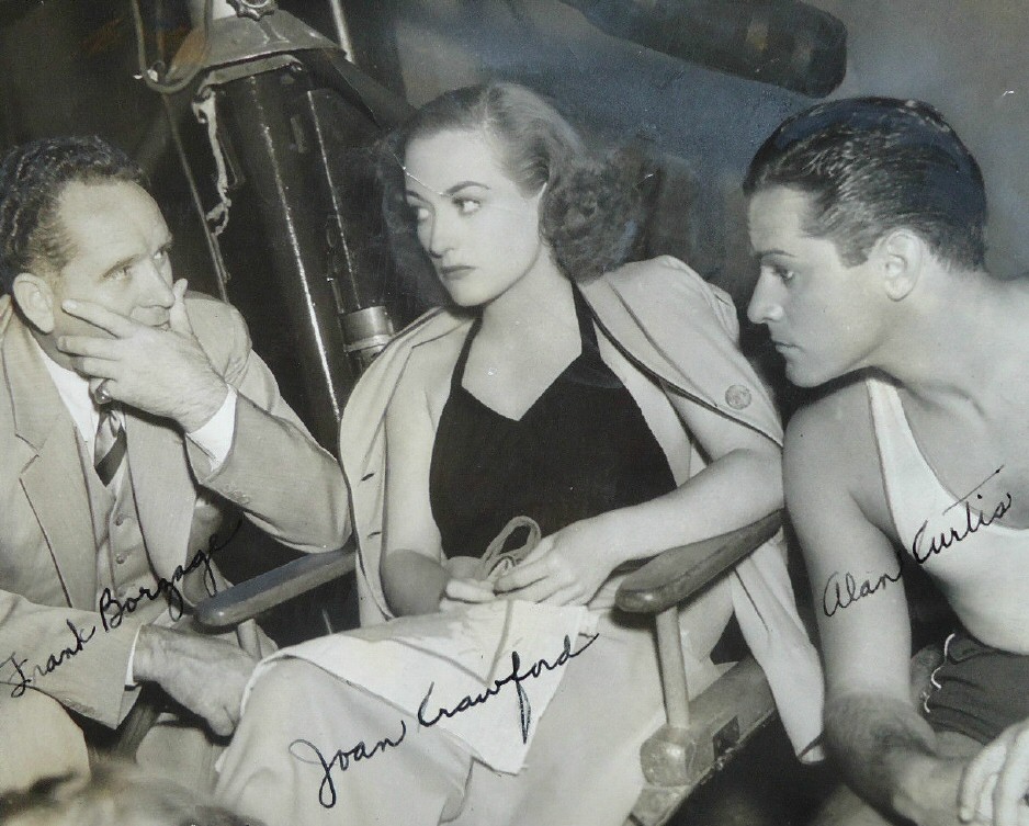 1938. On the set of 'Mannequin' with director Frank Borzage and Alan Curtis.