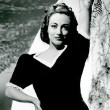 1938 publicity by Willinger. Gown by Adrian.