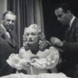 1939. On the set with director Schunzel and stylist Guilaroff.