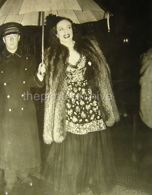 March 27, 1939. Arriving at a NYC club to meet soon-to-be ex Franchot Tone.