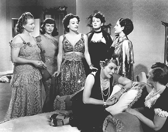 With Phyllis Povah, Paulette Goddard, Ros Russell, Mary Boland, and Norma Shearer.