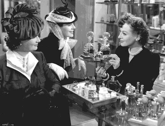 With Rosalind Russell, center.