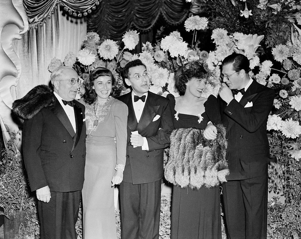 1939. At the premiere of 'The Women' with LB Mayer, Paulette Goddard, George Cukor, and Hunt Stromberg.