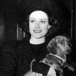 1939. On train with pup.