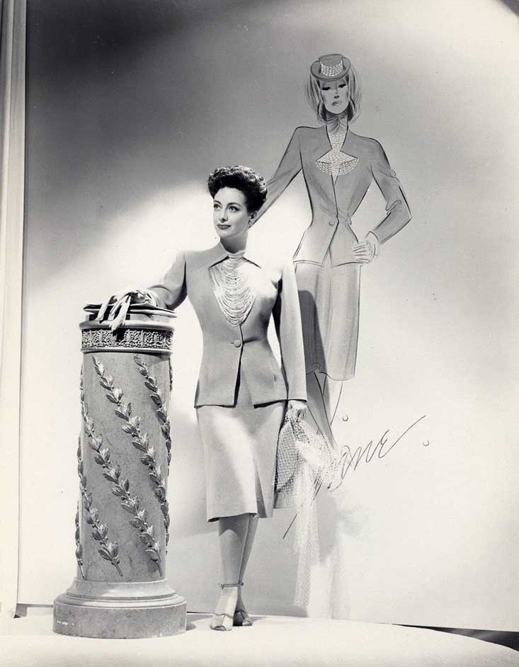 1942. Publicity for 'Reunion in France.' Costume and sketch by Irene.