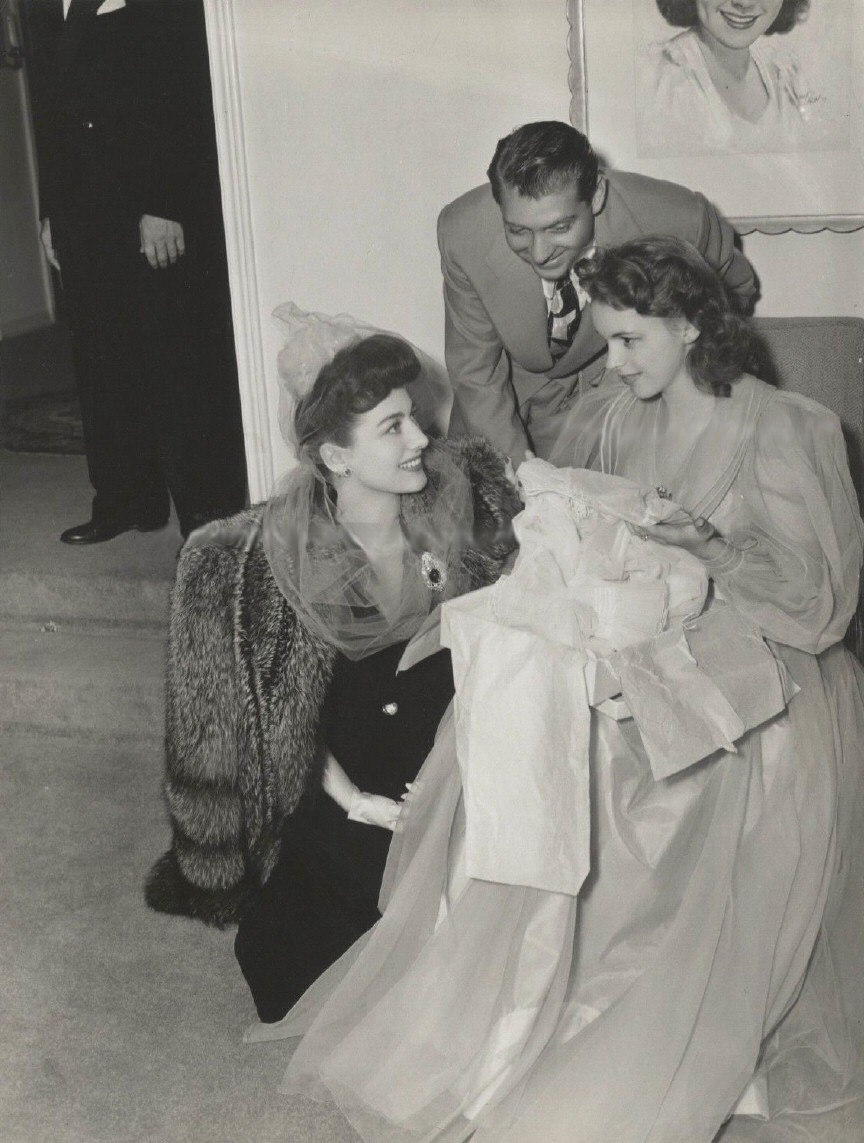 Summer 1941. With Judy Garland and husband-to-be David Rose. (Either at Judy's 19th birthday party, or at her bridal shower.)