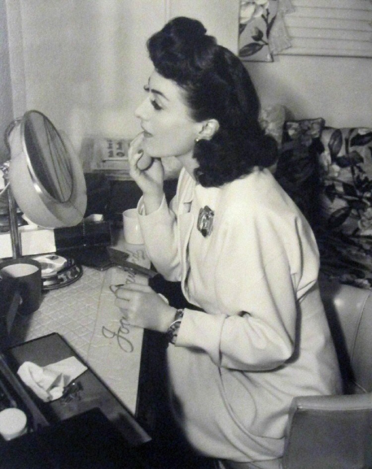 1941. On the set of 'When Ladies Meet.'