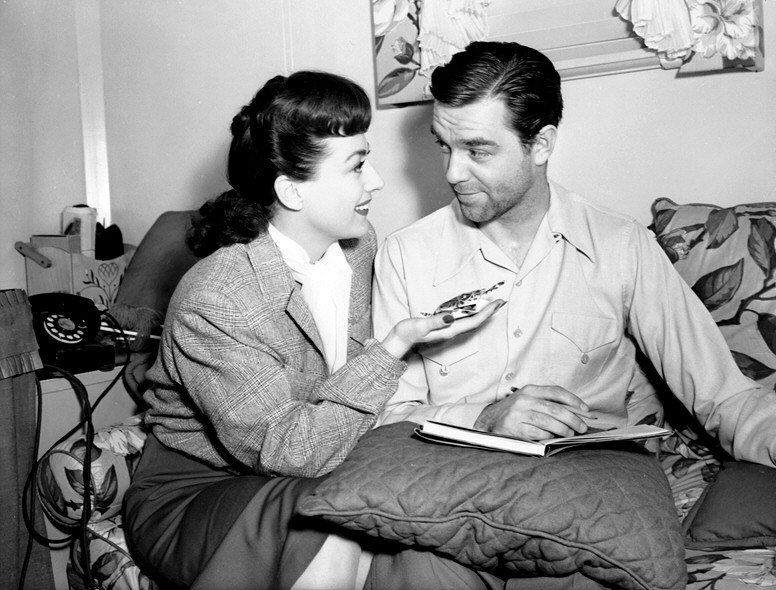 1943. On the set of 'Above Suspicion' with husband Phillip Terry.