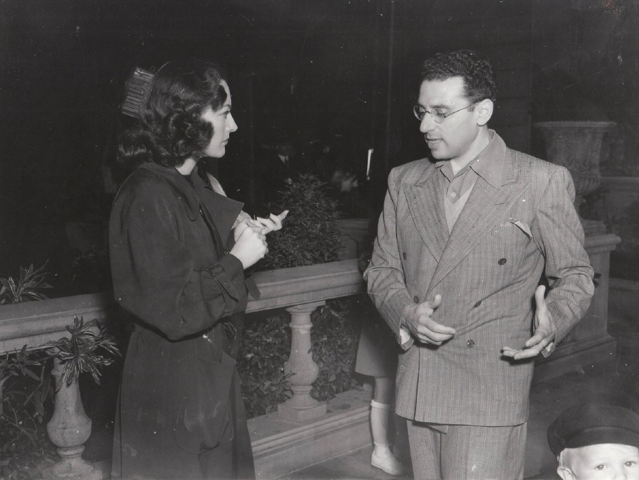 February 14, 1941. On the set of 'Woman's Face' with director George Cukor.