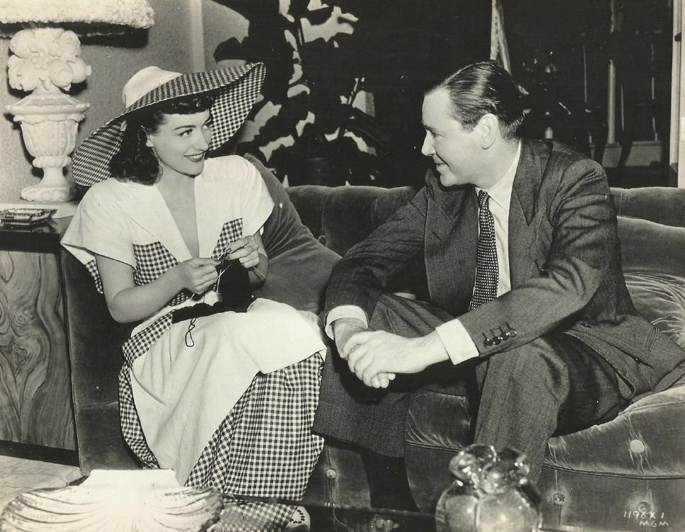 1941. 'When Ladies Meet.' On the set with Herbert Marshall.