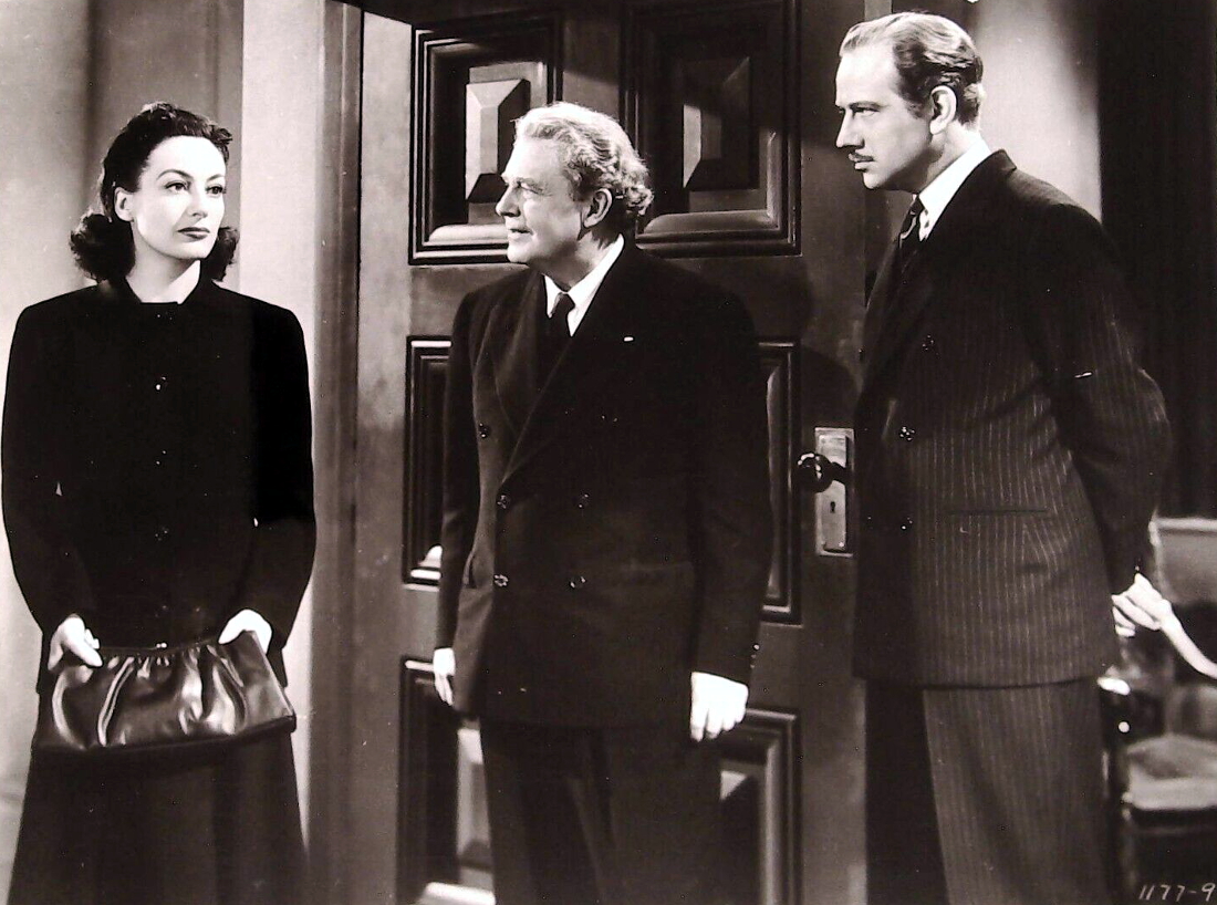 1941. 'A Woman's Face.' With Melvyn Douglas, right.