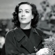 1941. 'A Woman's Face.' Includes press caption.