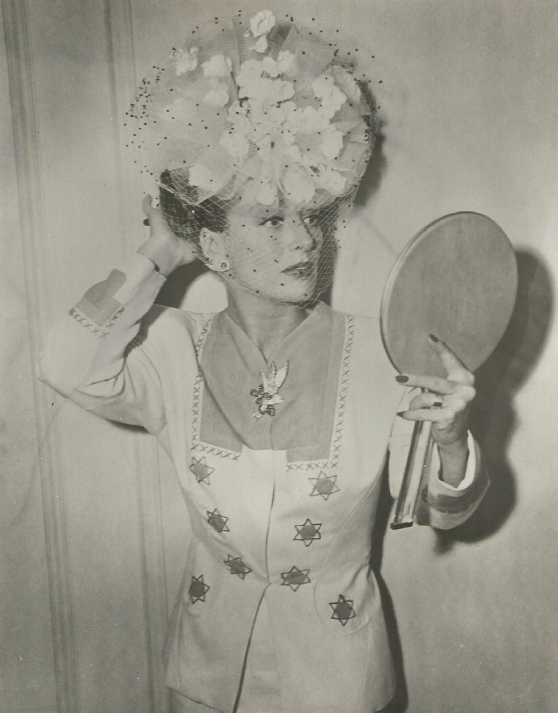 July 1945 at the Beverly Wilshire. (Hat by Walter Florell.)