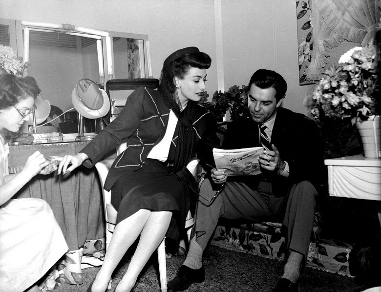 1943. On the set of 'Above Suspicion' with husband Philip Terry.