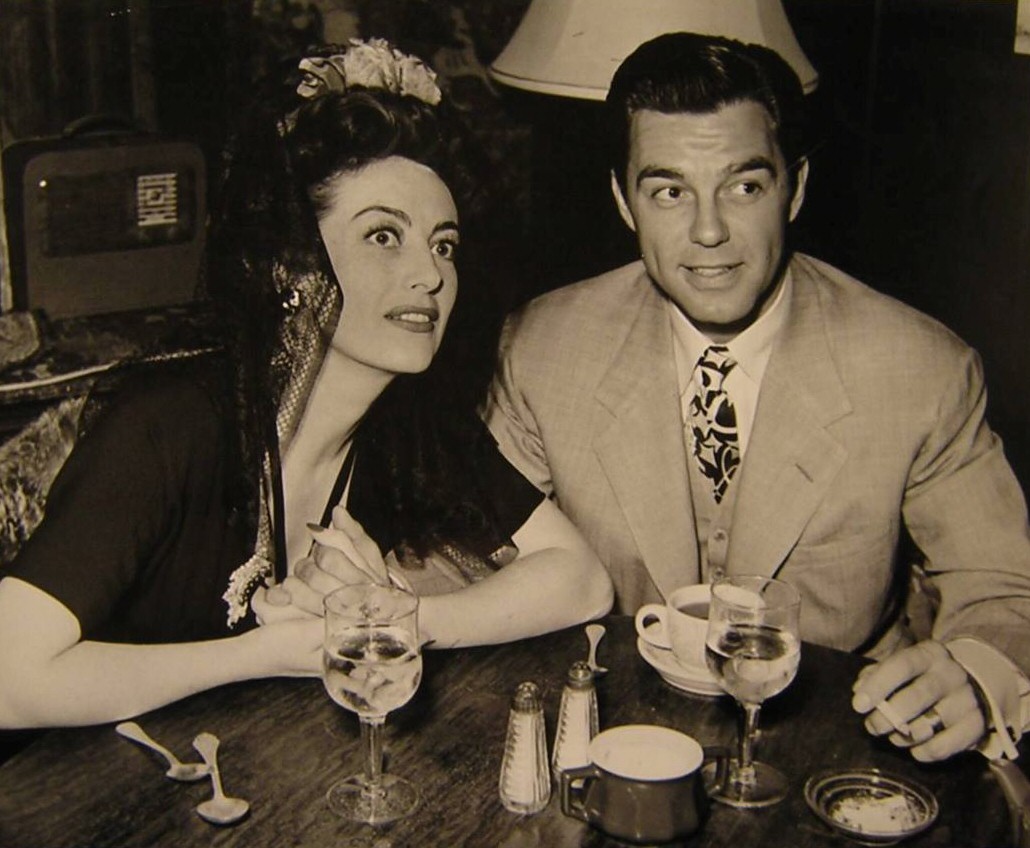 1942. With husband Phillip Terry at LA's Cock'n Bull restaurant.