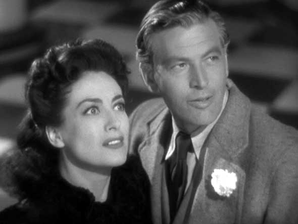 1942. 'Reunion in France' film still with Philip Dorn.