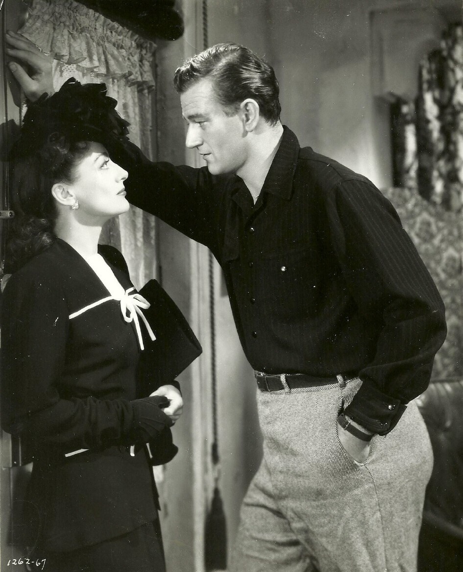 1942. 'Reunion in France.' With John Wayne.