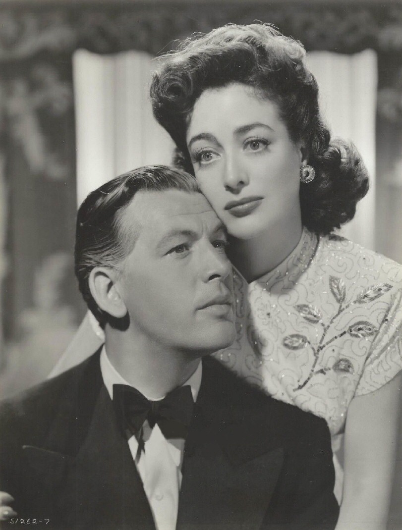 1942. 'Reunion in France' publicity with Philip Dorn.