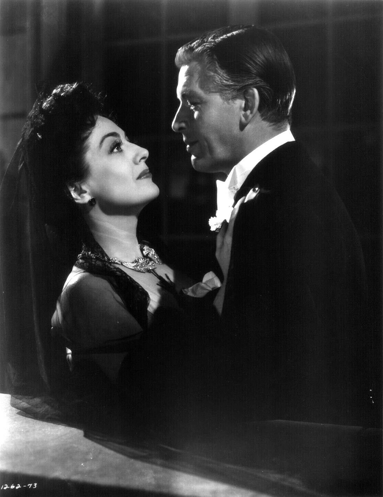 1942. 'Reunion in France' with Philip Dorn.