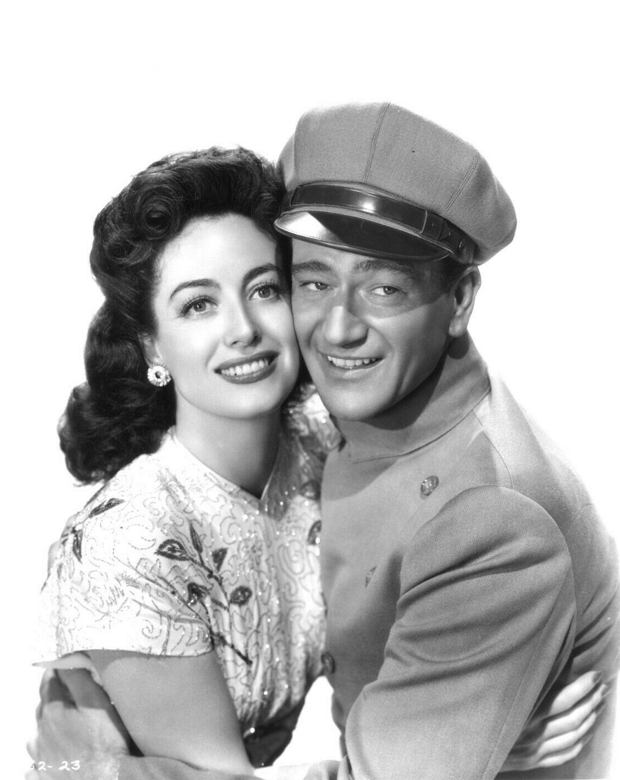1942. 'Reunion in France' publicity with John Wayne.