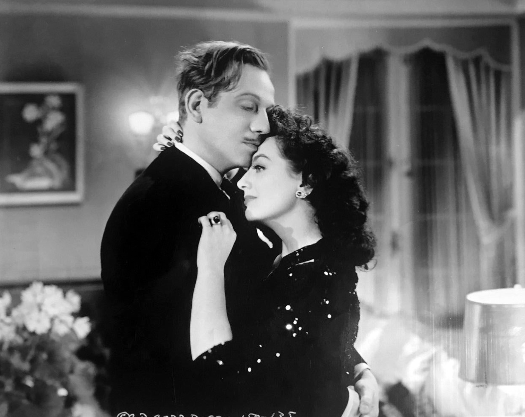 1942. 'They All Kissed the Bride.' With Melvyn Douglas.