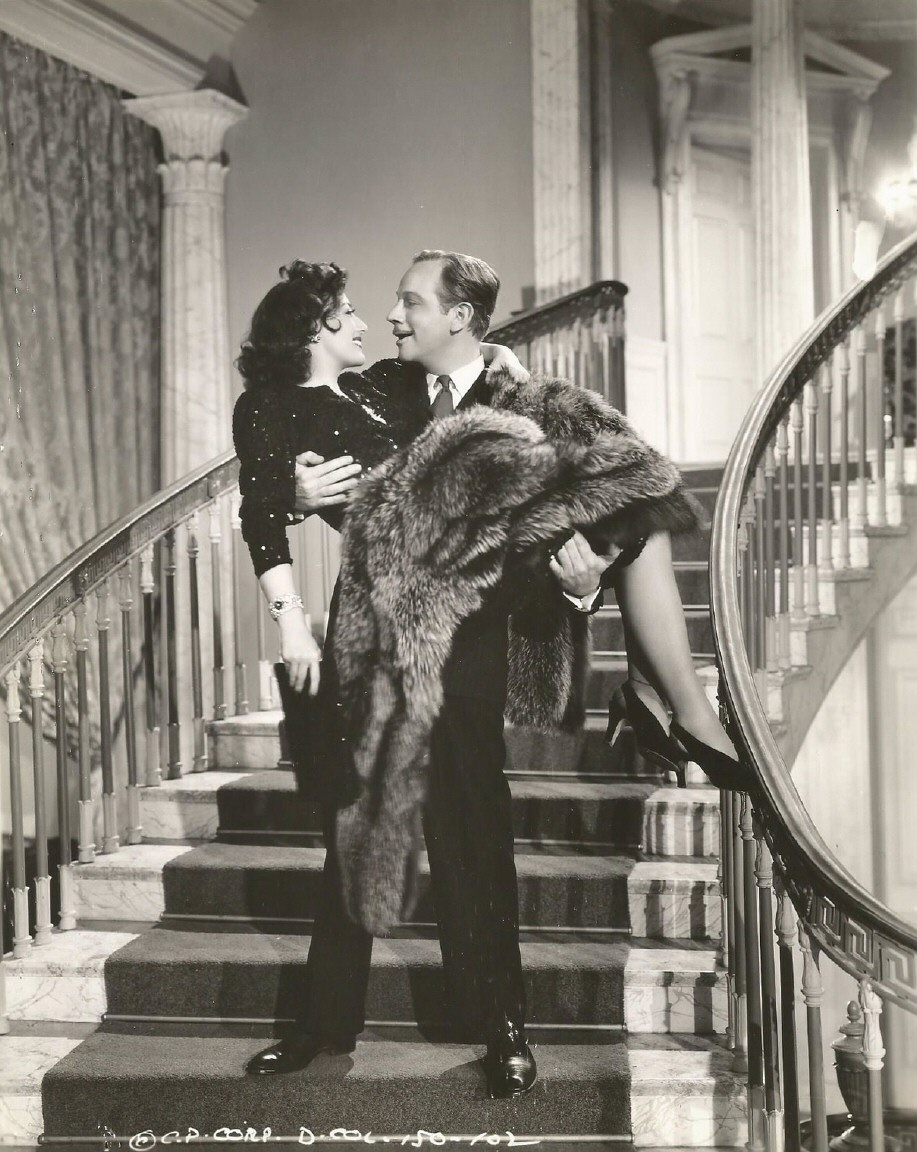 1942. 'They All Kissed the Bride.' With Melvyn Douglas.