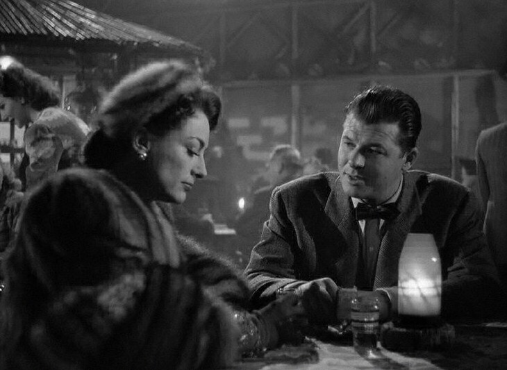 1945. 'Mildred Pierce' screen shot with Jack Carson.