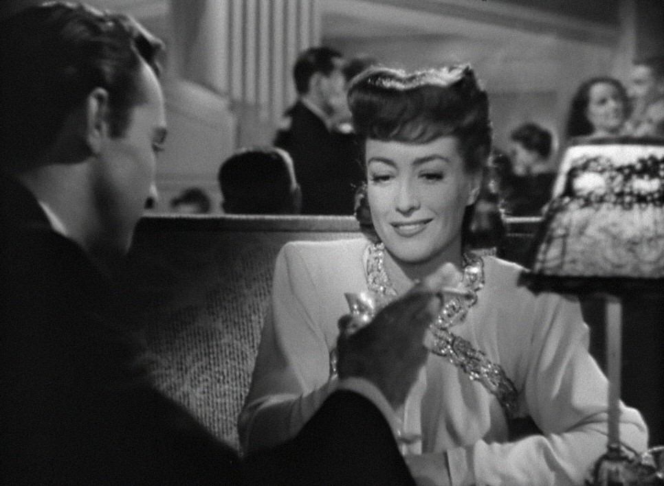 1945. 'Mildred Pierce.' With Zachary Scott.