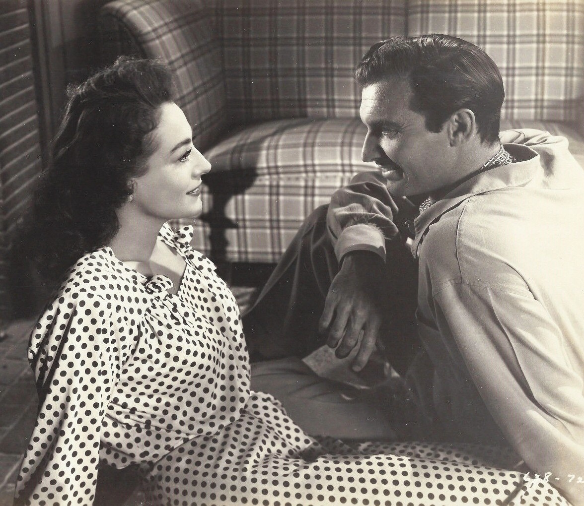 1945. 'Mildred Pierce.' With Zachary Scott.