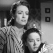 1945. 'Mildred Pierce.' Two screen shots with Ann Blyth.