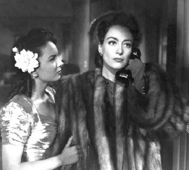 Suffering in fur: With Ann Blythe in 1945's 'Mildred Pierce.'
