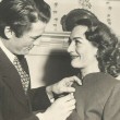 December 1945. Joan and Gregory Peck receive the Golden Apple Award from the Hollywood Women's Press Club for 'Most Cooperative Actor/Actress.'