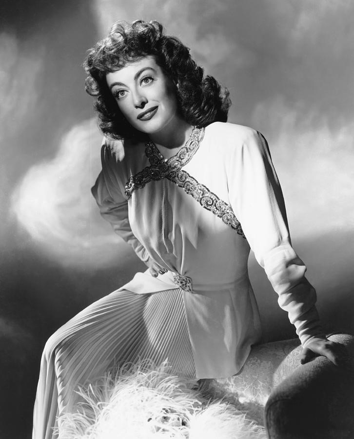 1945. Publicity for 'Mildred Pierce' shot by Bert Six.
