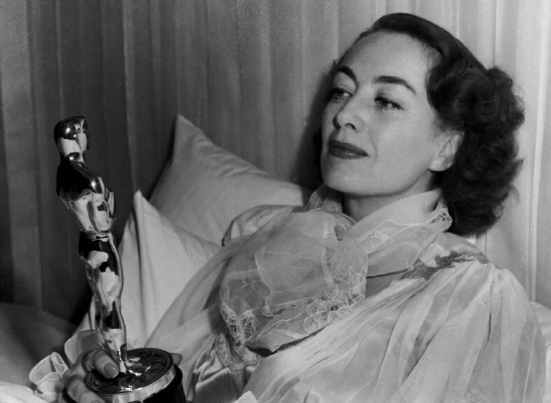 3/7/46. At home with her new Oscar.