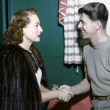 1946. On the set of 'Humoresque' with Ronald Reagan. Two color candids.