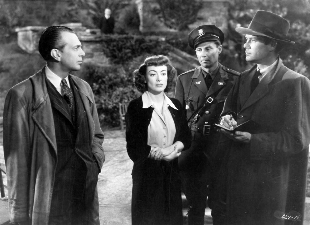 1947. 'Possessed.' With Raymond Massey, left.