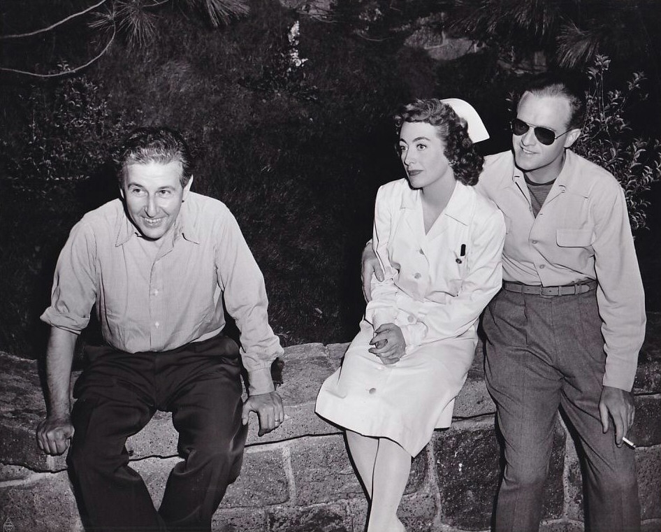 1947. On the set of 'Possessed' with director Bernhardt, left, and Van Heflin.