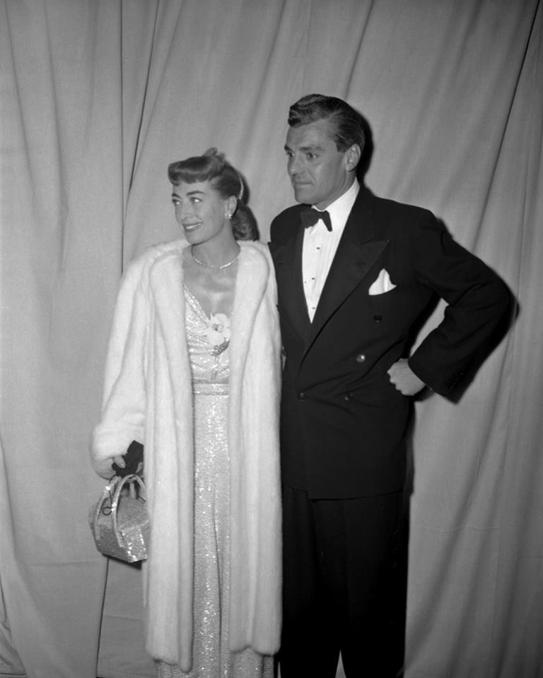 March 1948. At the 20th annual Academy Awards with Greg Bautzer.