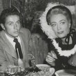 1948. At Don the Beachcomber with director Irving Reis, goddaughter Joan Evans, and Farley Granger.