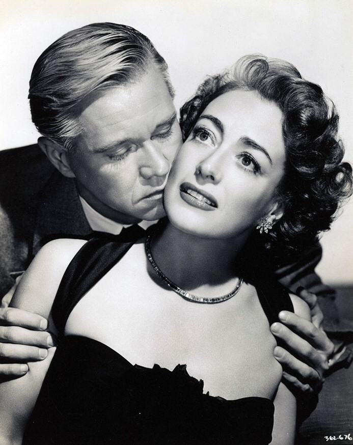 1949. 'Flamingo Road' publicity with David Brian.