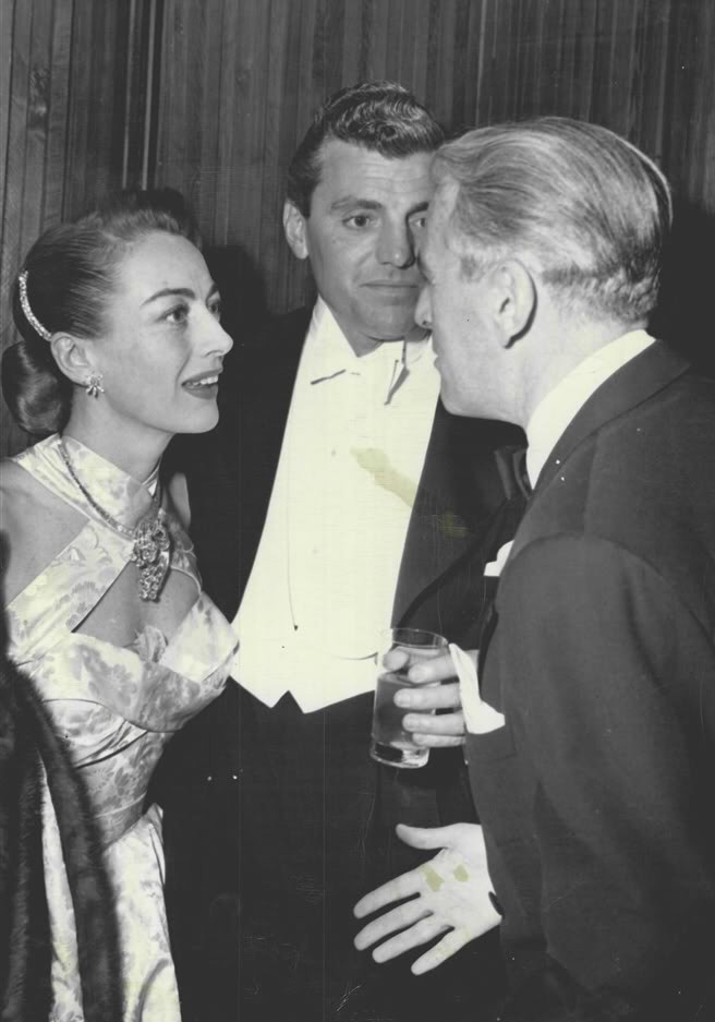 January 1949. With Greg Bautzer at a Screentown party.